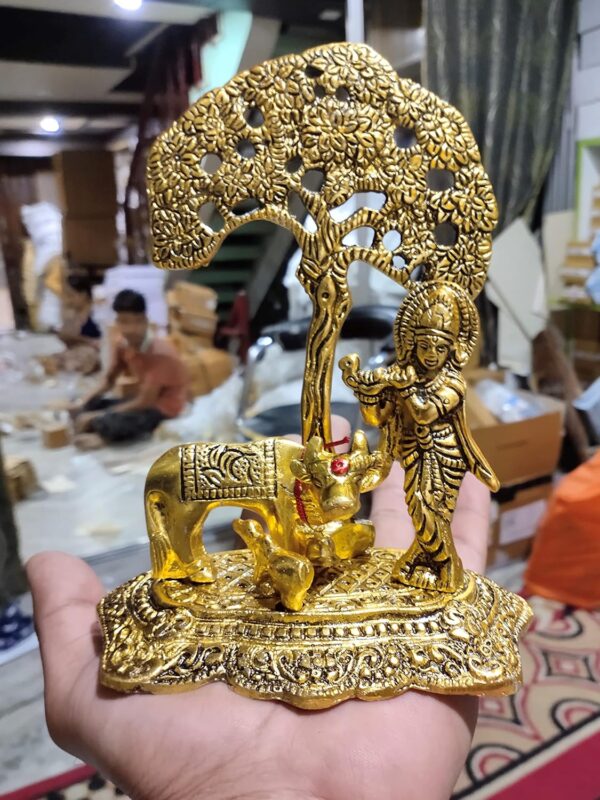 1772571280_KridayKraft-Prince-Home-Decor-Gifts-Metal-Krishna-With-Cow-Standing-Under-Tree-Plying-Flute-Gold-12.5X8X16Cm-1-Piece-figuresReligious.jpg KridayKraft Prince Home Decor & Gifts Metal Krishna With Cow Standing Under Tree Plying Flute (Gold, 12.5X8X16Cm), 1 Piece, figures;Religious