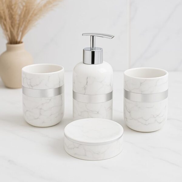 1773718613_Whizzo-Luxury-Ceramic-Bathroom-Accessories-Set-–-4-Pcs-White-Marble-Finish-with-Silver-Lining-Soap-Dispenser-Toothbrush-Holder-Tumbler-Soap-Dish-Bathroom-Decor-BS-836-White-Silver.jpg Whizzo Luxury Ceramic Bathroom Accessories Set – 4 Pcs | White Marble Finish with Silver Lining | Soap Dispenser, Toothbrush Holder, Tumbler & Soap Dish | Bathroom Decor (BS-836, White & Silver)