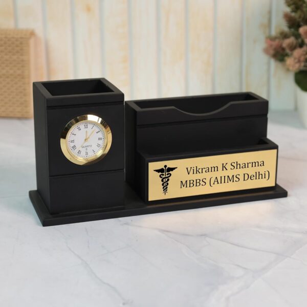1774493094_Deskart-Doctor-Pen-Stand-Customized-Desk-Organizer-for-Doctors-and-Medical-Aspirants-with-Pencil-Holder-Clock-Mobile-Visiting-Card-Holder-and-Personalized-Name-Engraved-Plate.jpg Deskart Doctor Pen Stand | Customized Desk Organizer for Doctors and Medical Aspirants with Pencil Holder, Clock, Mobile, Visiting Card Holder and Personalized Name Engraved Plate