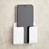 Radha Govind Wall Mounted Smartphone Holder (Pack of 3) | Mobile & Remote Storage Case with Strong Adhesive Strips, Charging Port Design, Viewing Angle, Multi-Purpose Wall Stand for Phones, White