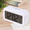 Kadio Digital Alarm Clock,Battery Operated Small Desk Clocks,with Date,Indoor Temperature,Smart Night Light,LCD Electronic Clock for Bedroom Home Office - White (KDwhite)