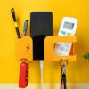 Wall Mobile Holder | Multi-Purpose Mobile Stand | Remote Holder Wall Mobile Holder | Multi-Purpose Mobile Stand | Remote Holder & Mobile Charging Stand, Phone Stand for Charging with Pen and Key Holder Useful Gadget- Orange