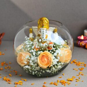 FlowerAura Fresh Live 6 Peach Roses Flowers Bouquet with Ganesha FlowerAura Fresh Live 6 Peach Roses Flowers Bouquet with Ganesha Idol in Fish Bowl for Living Room, Table Decor, Home Decor, Temple Decor, Gift for Religious Events & Occasions (Same Day Delivery)