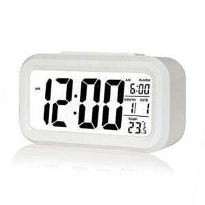 Kadio Digital Alarm Clock,Battery Operated Small Desk Clocks,with Date,Indoor Temperature,Smart Night Light,LCD Electronic Clock for Bedroom Home Office - White (KDwhite)