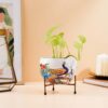 1775236163_Amazon-Brand-Solimo-Blossom-Flower-Planter-with-Tripod-Stand-Versatile-Indoor-Outdoor-Decor-Secure-Support-for-Pots.jpg Amazon Brand - Solimo Blossom Flower Planter with Tripod Stand | Versatile Indoor & Outdoor Decor | Secure Support for Pots