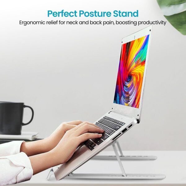 1775955375_Portronics-My-Buddy-K-Lite-Foldable-Laptop-Stand-with-Adjustable-Heights-Anti-Slip-Silicone-Pads-Collapsible-Design-5-kg-Max-Weight-ABS-Build-Portable-Lightweight-Holder-Riser-White.jpg Portronics My Buddy K Lite Foldable Laptop Stand with Adjustable Heights, Anti-Slip Silicone Pads, Collapsible Design, 5 kg Max Weight, ABS Build, Portable & Lightweight Holder Riser (White)