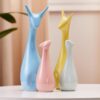 Amazon Basics Home Decor Happy Deer Family Action Statue Piano Finish Ceramic Figures(Set of 4,Multicolor)
