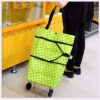 Foldable-Grocery-Shopping-Bag-with-Wheels-Expandable-Trolley-Bag-for-Kitchen-Market-Portable-Handbag-with-Collapsible-Rolling-Wheels.-Pack-of-1.jpg Foldable Grocery Shopping Bag with Wheels, Expandable Trolley Bag for Kitchen & Market, Portable Handbag with Collapsible Rolling Wheels. (Pack of 1)