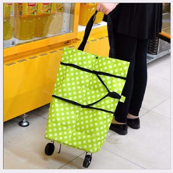 Foldable-Grocery-Shopping-Bag-with-Wheels-Expandable-Trolley-Bag-for-Kitchen-Market-Portable-Handbag-with-Collapsible-Rolling-Wheels.-Pack-of-1.jpg Foldable Grocery Shopping Bag with Wheels, Expandable Trolley Bag for Kitchen & Market, Portable Handbag with Collapsible Rolling Wheels. (Pack of 1)