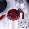 GANESH Multipurpose Stainless Steel Handy Oil Pourer, Food Grade Plastic Olive Oil, Vinegar Dispenser, Dust and Leak Proof Jar, Multicolour (1000 ML)