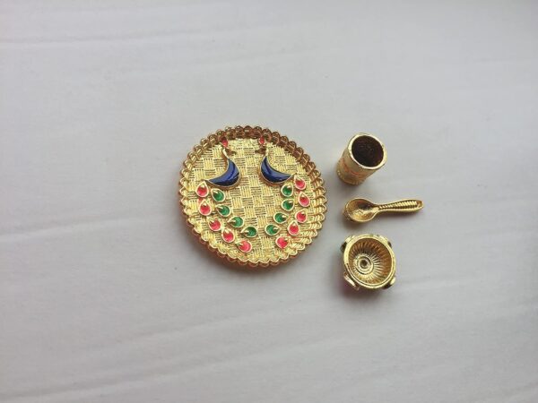 Handmade Decorative small cute Lunch plate for thakurji Kanhaji ladoo Handmade Decorative small cute Lunch plate for thakurji Kanhaji ladoo gopal krishna consisting 1 Plate 1 Glass 1 bowl and 1 spoon of yellow polish made up of metal set of 1