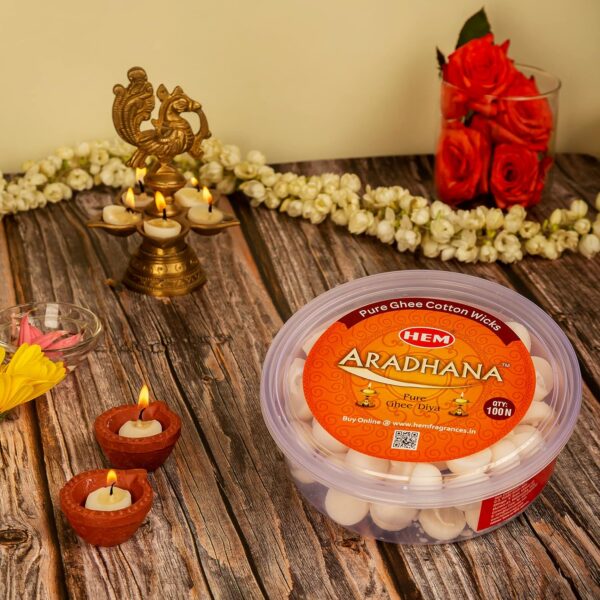 Hem-Aradhna-Pure-Ghee-Diya-with-Batti-Pack-of-100-Diyas-Pooja-Room-Items-for-Home-Wax-Free-Ghee-Wicks-for-Prayers-Rituals-Special-Occasions-Burning-Time-30-mins.jpg Hem Aradhna Pure Ghee Diya with Batti Pack of 100 Diyas | Pooja Room Items for Home | Wax Free | Ghee Wicks for Prayers, Rituals & Special Occasions | Burning Time: 30 mins