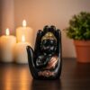 Meditating Buddha Statue in Hand Showpiece for Home Decor | Black & Gold Resin Buddha Idol for Living Room, Office, Table Decor & Gift Item (Pack of 4)