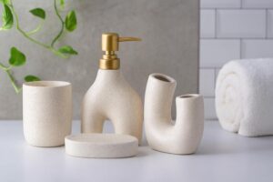 Whizzo Ceramic 4 Pcs Bathroom Accessories Set | Soap Dispenser with Golden Pump, Toothbrush Holder, Soap Dish & Tumbler | Modern Luxury Bathroom Countertop Organizer (BS-845, Light Pink)
