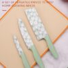 1778012336_3-Piece-Professional-Knife-Set-–-Chef-Knife-Utility-Knife-Santoku-Knife-with-Ergonomic-Handles-High-Carbon-Stainless-Steel-Colour-Coated-Blades.jpg 3-Piece Professional Knife Set – Chef Knife, Utility Knife, Santoku Knife with Ergonomic Handles, High Carbon Stainless Steel, Colour Coated Blades