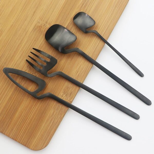 1778027205_Black-Cutlery-Set-–-4-Piece-Premium-Stainless-Steel-Silverware-Set-Matte-Black-Spoon-Fork-Knife-Teaspoon-Luxury-Flatware-Set-for-Dining-Table-Home-Kitchen-Restaurant-Use.jpg Black Cutlery Set – 4 Piece Premium Stainless Steel Silverware Set | Matte Black Spoon Fork Knife Teaspoon | Luxury Flatware Set for Dining Table, Home, Kitchen & Restaurant Use