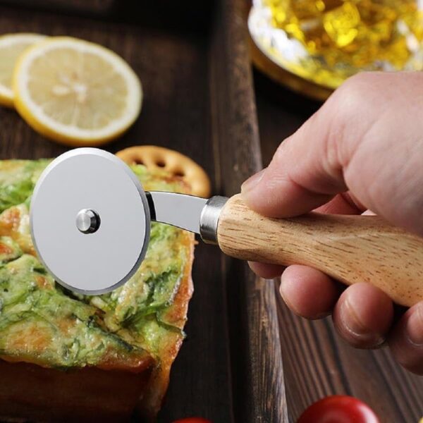 1778049595_Pizza-Cutter-Set-2-in-1-Stainless-Steel-Wheel-Rocker-Knife-with-Wooden-Handle-Serrated-Blade-Pizza-Slicer-and-Rotating-Cutter-for-Kitchen-Baking-Tools-Easy-Slice-for-Pizza-Cheese-and-Bread.jpg Pizza Cutter Set 2-in-1 Stainless Steel Wheel & Rocker Knife with Wooden Handle - Serrated Blade Pizza Slicer and Rotating Cutter for Kitchen Baking Tools | Easy Slice for Pizza, Cheese and Bread
