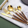 1778072226_Stainless-Steel-Cooking-Serving-Spoon-Set-of-5-Gold-Finish-Premium-Cutlery-Set-with-Spoon-Fork-Knife-Luxury-Mirror-Polish-Kitchen-Serving-Tools-for-Dining-Buffet-Parties-Gifting.jpg Stainless Steel Cooking & Serving Spoon Set of 5 (Gold Finish) | Premium Cutlery Set with Spoon, Fork & Knife | Luxury Mirror Polish Kitchen Serving Tools for Dining, Buffet, Parties & Gifting