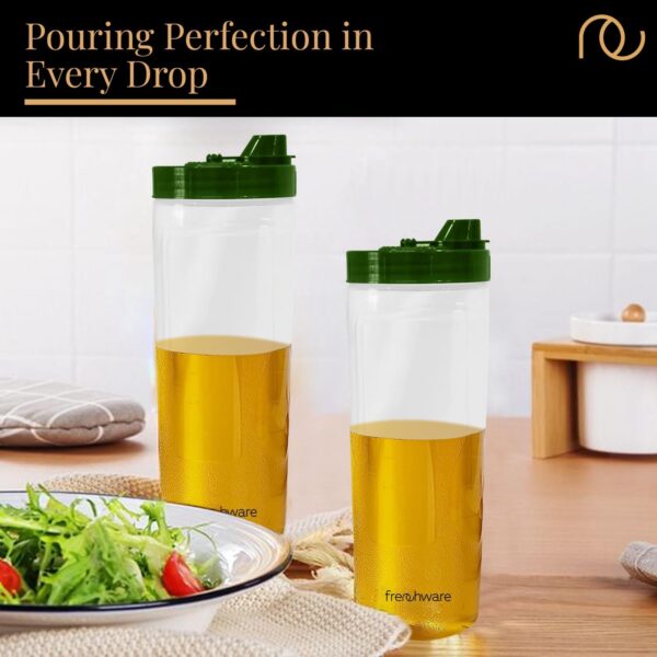 1778481552_Frenchware-Oil-Dispenser-Pack-of-2-1-Litre-Each-100-Food-Grade-BPA-Free-Plastic-Ideal-for-Storing-Pouring-Liquids-Cooking-Oils-Refined-Oils-Olive-Oil-Vinegar-Soy-Sauce-Green.jpg Frenchware Oil Dispenser (Pack of 2, 1 Litre Each) 100% Food-Grade, BPA-Free Plastic, Ideal for Storing & Pouring Liquids, Cooking Oils, Refined Oils, Olive Oil, Vinegar, Soy Sauce (Green)